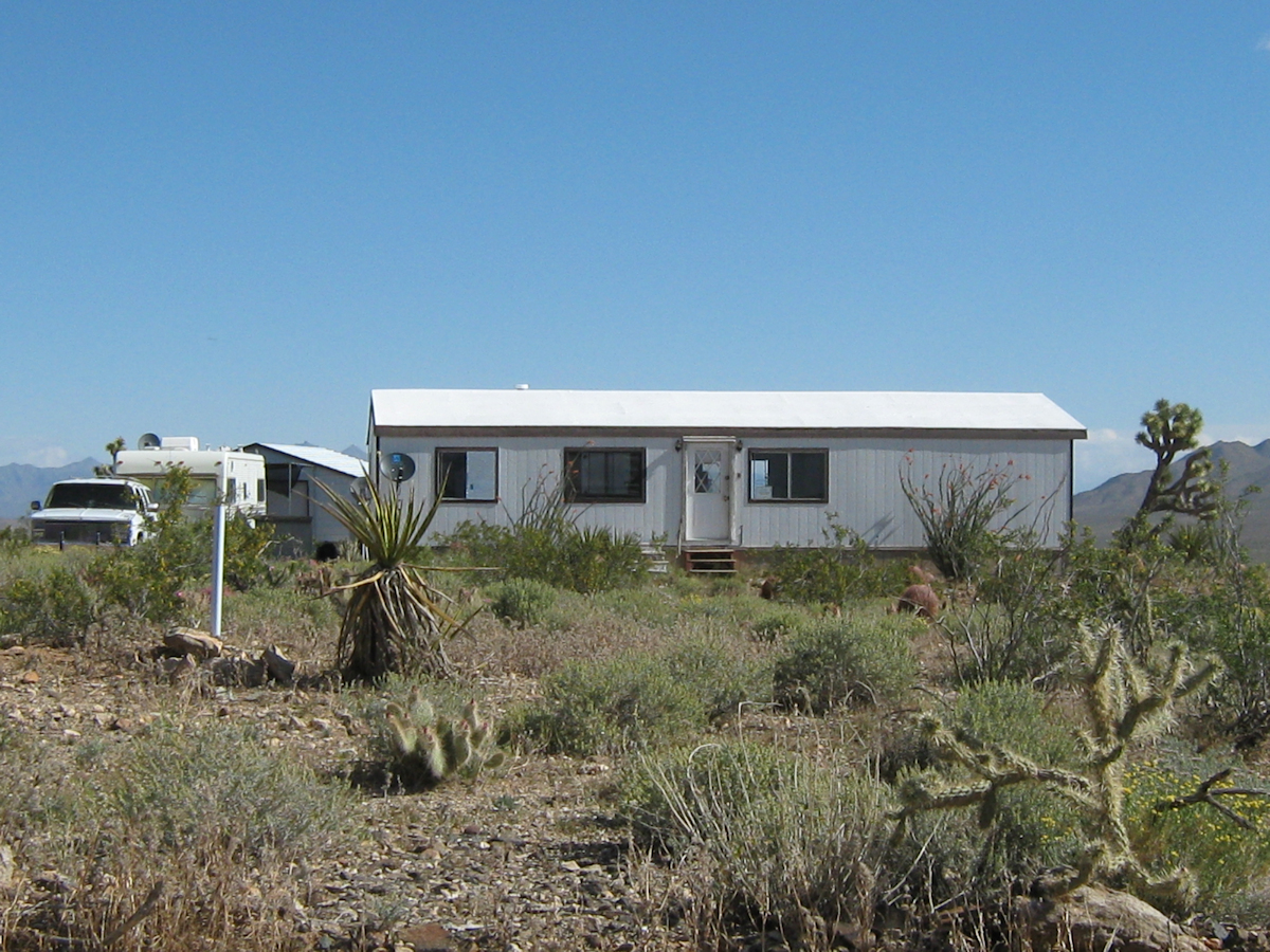 mobile home roof leak-free after 4 coats of Henry's elastomeric coating